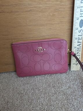 Coach Rose Pink Perforated Signature Leather Wristlet
